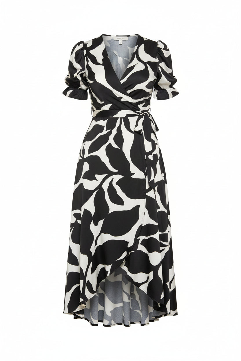 Vestido midi cruzado con estampado de hojas en blanco y negro y mangas abullonadas