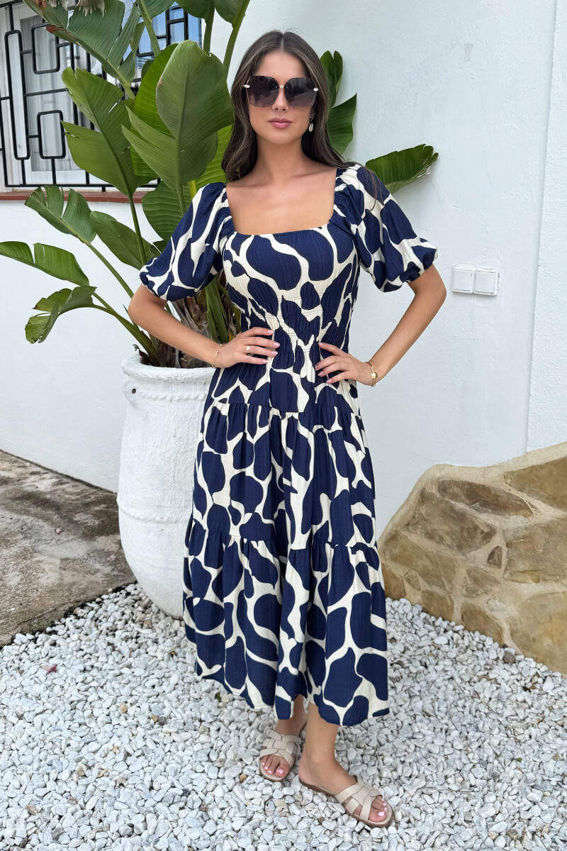 Vestido midi con mangas abullonadas y estampado abstracto en azul marino y crema