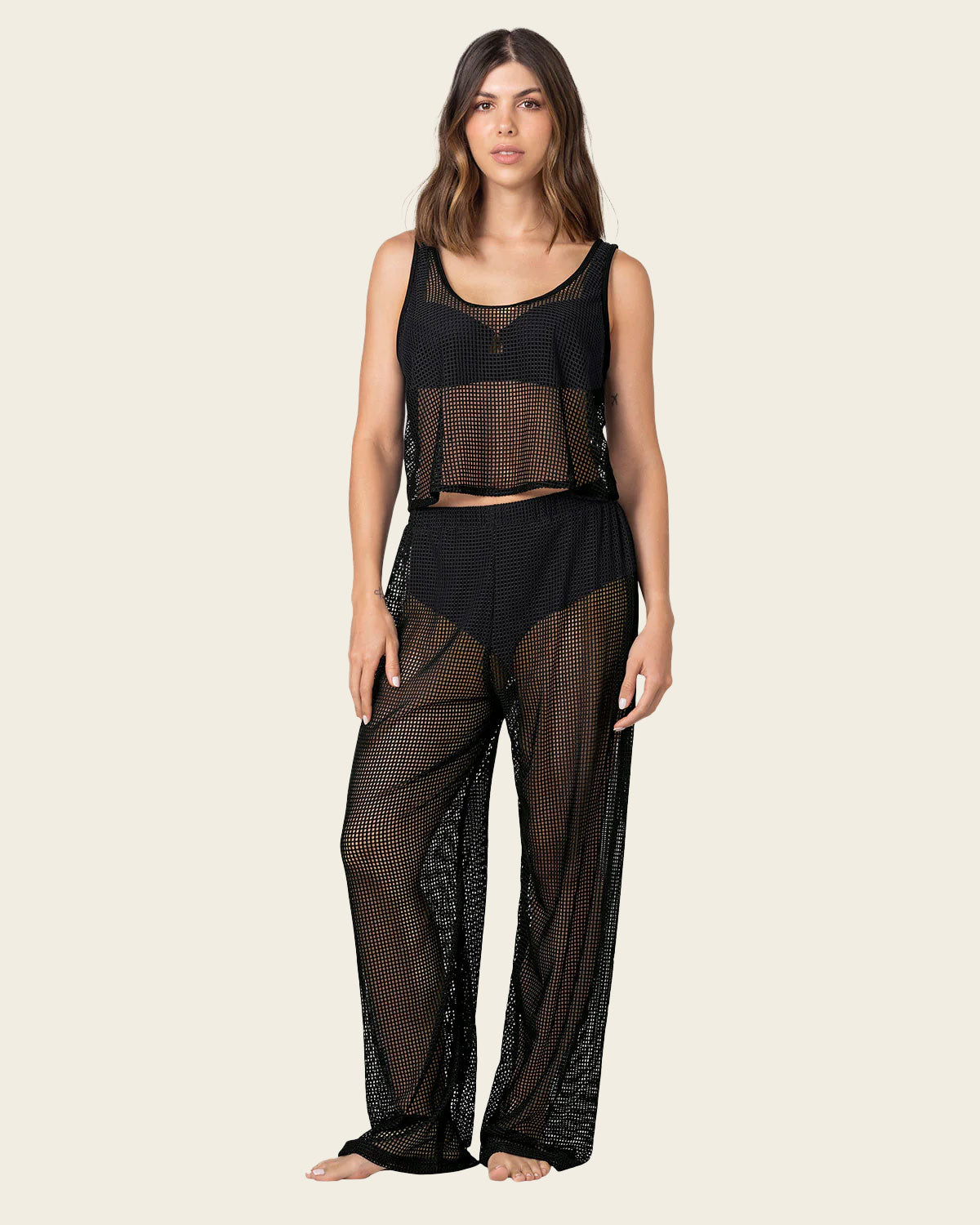 Set en malla, pantalón y camiseta